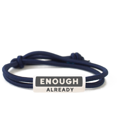 The Enough Already Active Bracelet by Joni x MudLOVE, featuring a durable stoneware clay bead with the words &